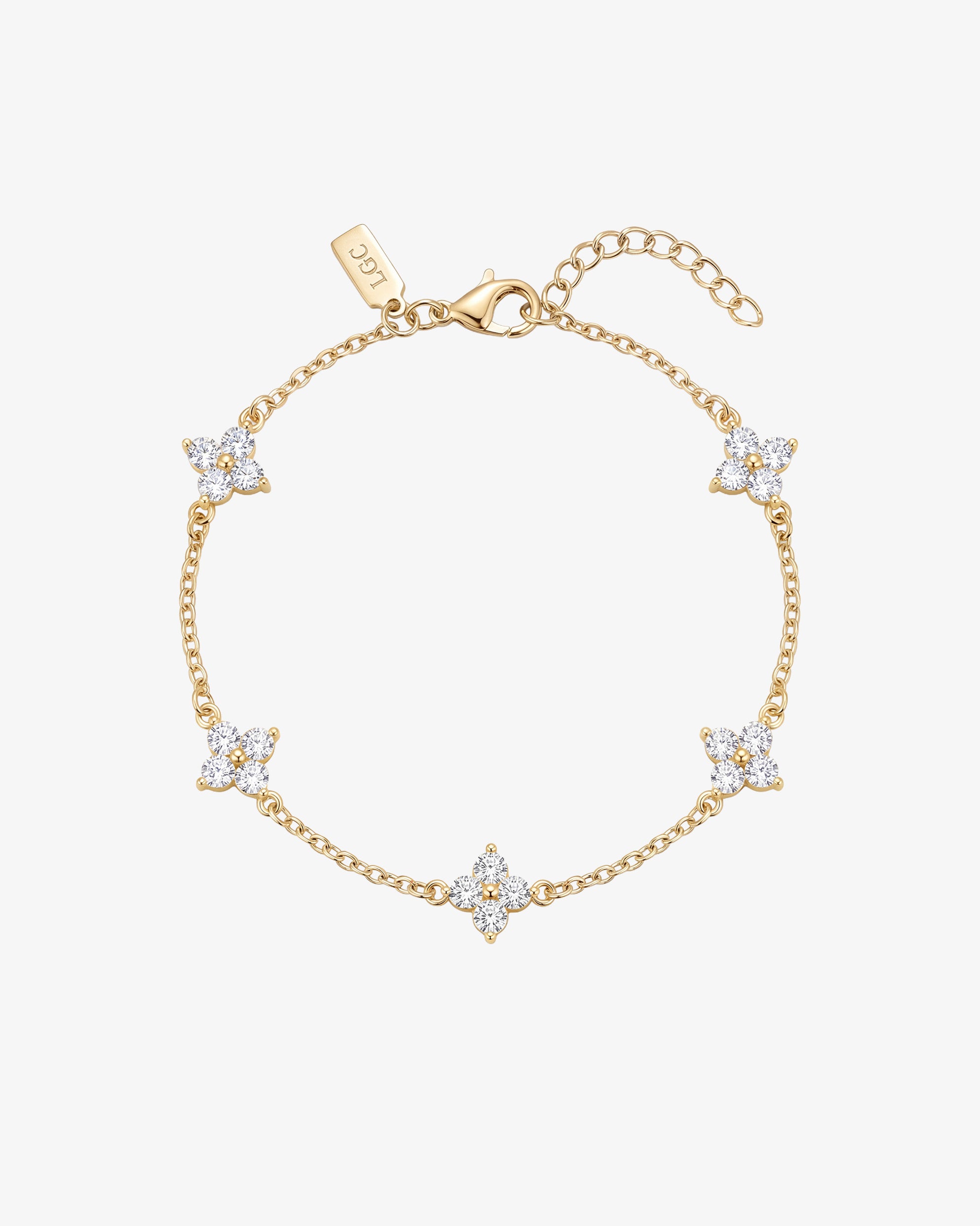 Gold Clover bracelet featuring a four leaf flower of crystals on a delicate chain with a lobster clasp