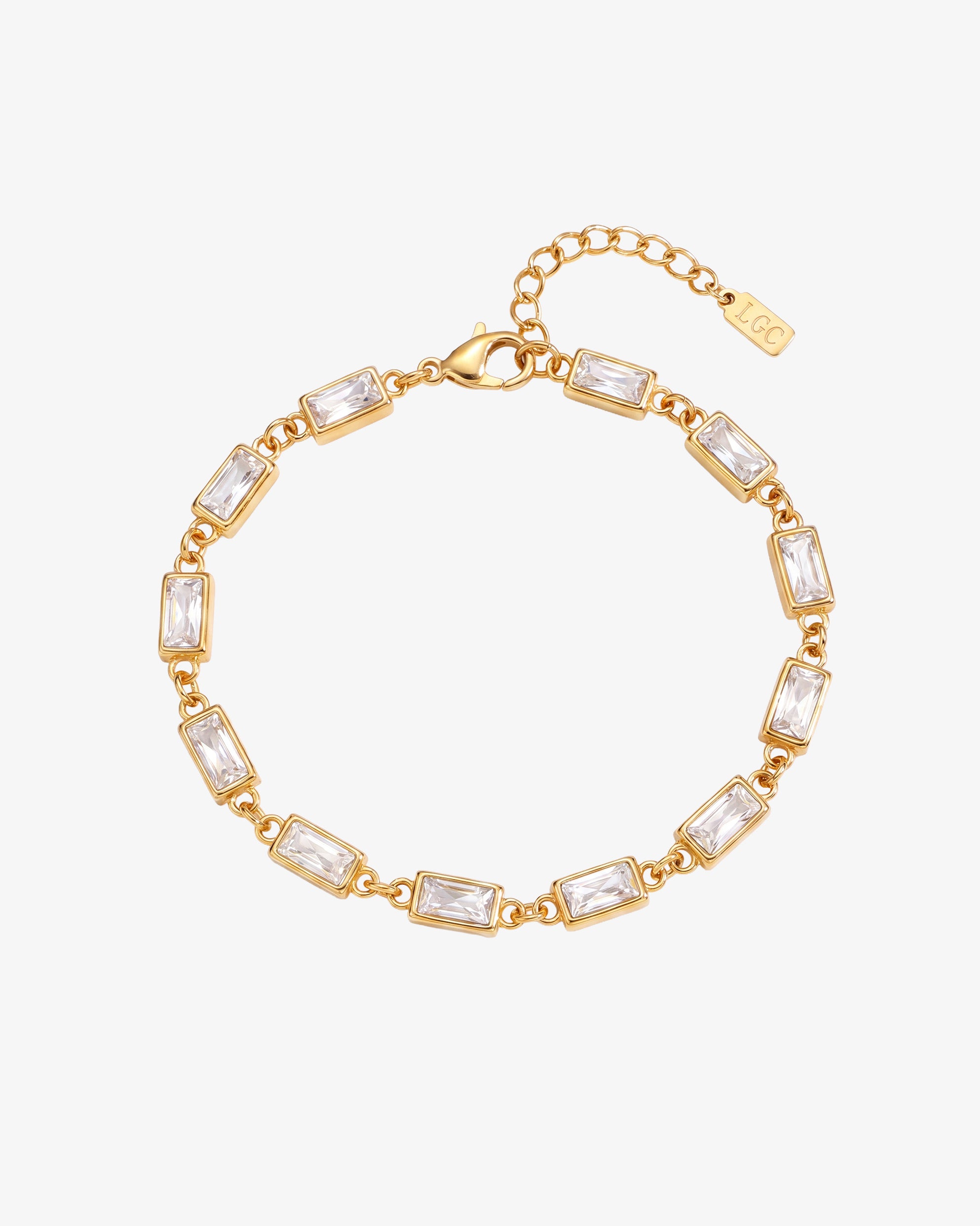 OMEN Gold Bracelet with rectangular clear stones in gold settings and a lobster clasp