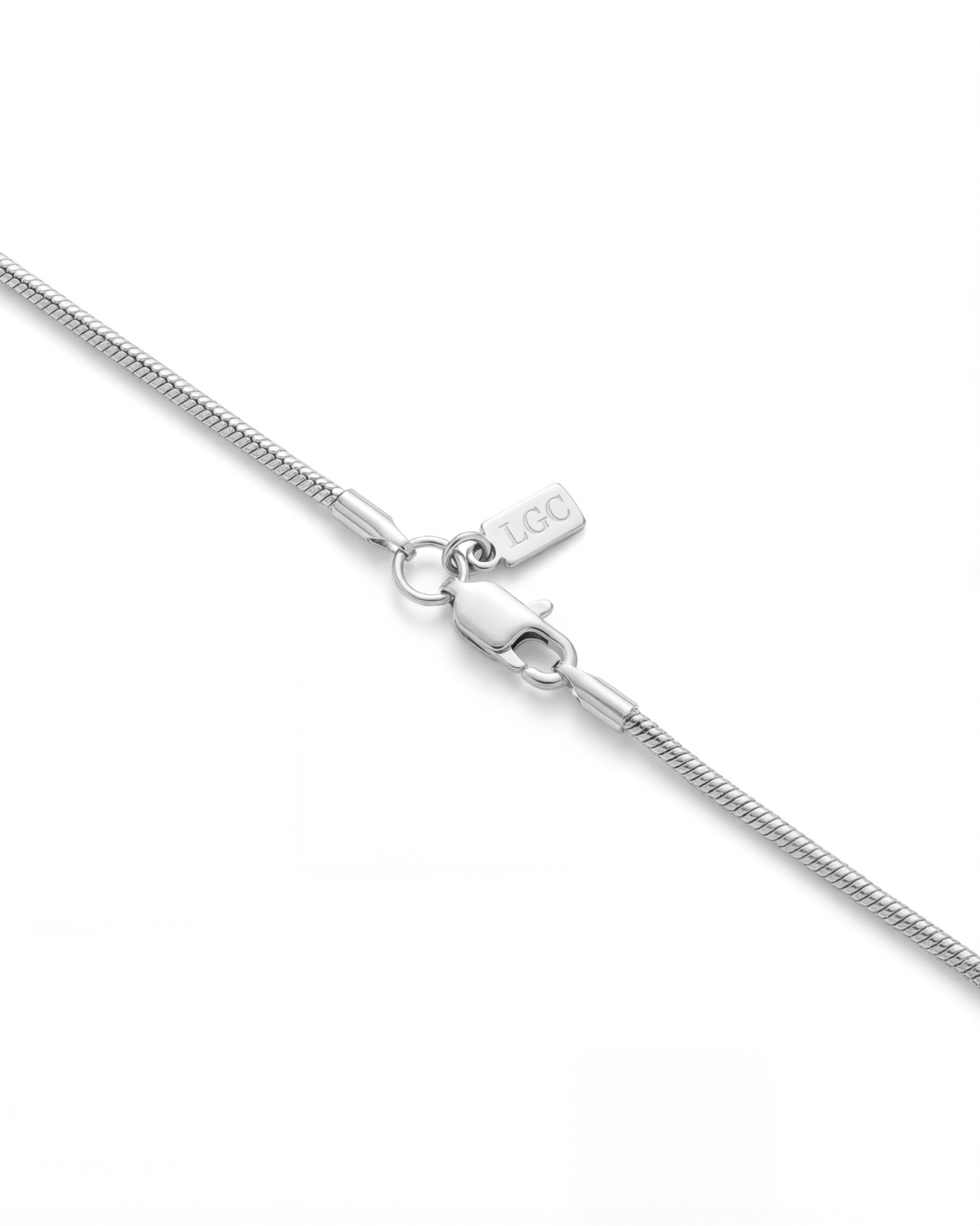 Sunset Silver Chain close up showing a 2 mm silver chain with a clasp on white background