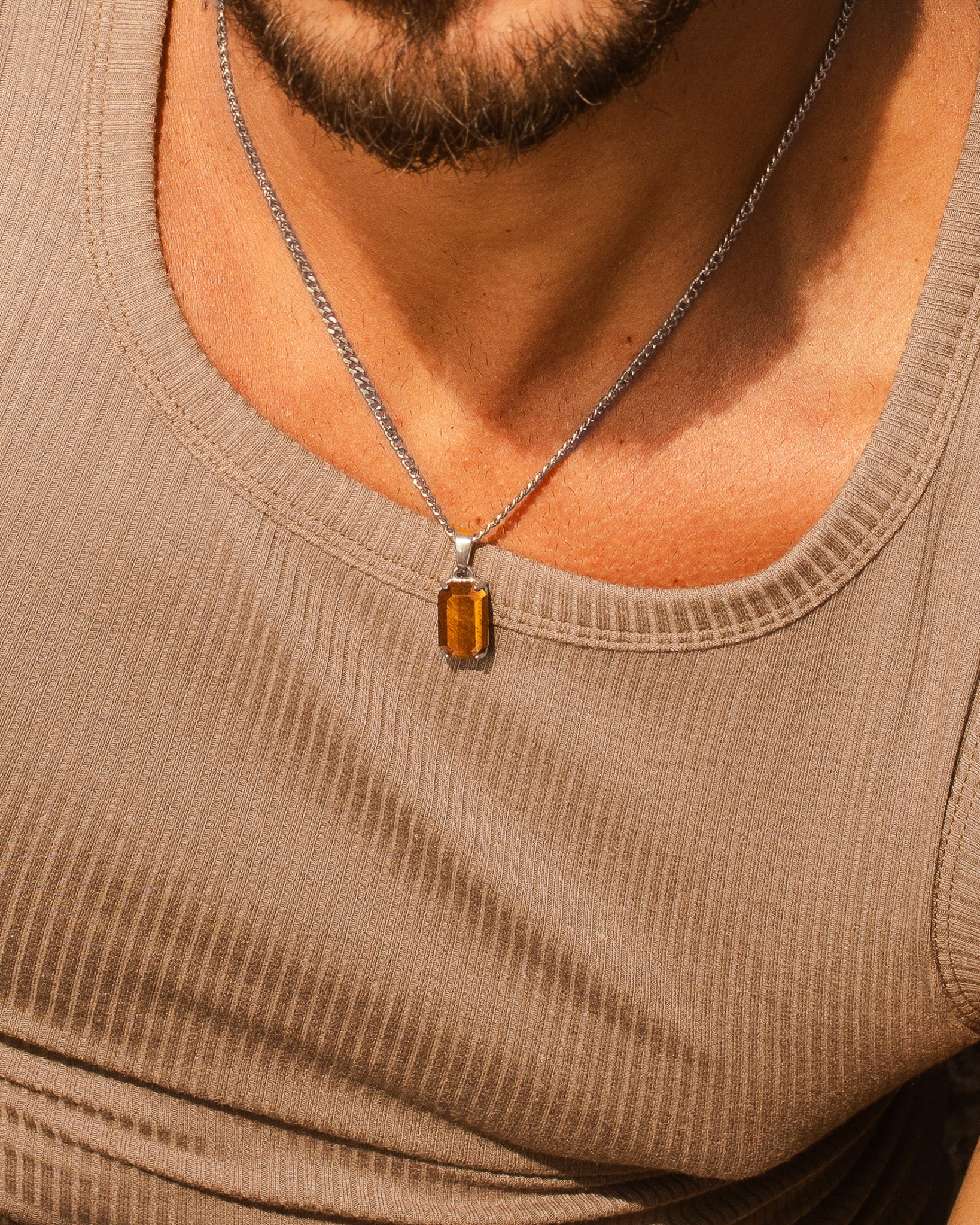 VOLT silver necklace with a silver bail and orange rectangular gemstone pendant