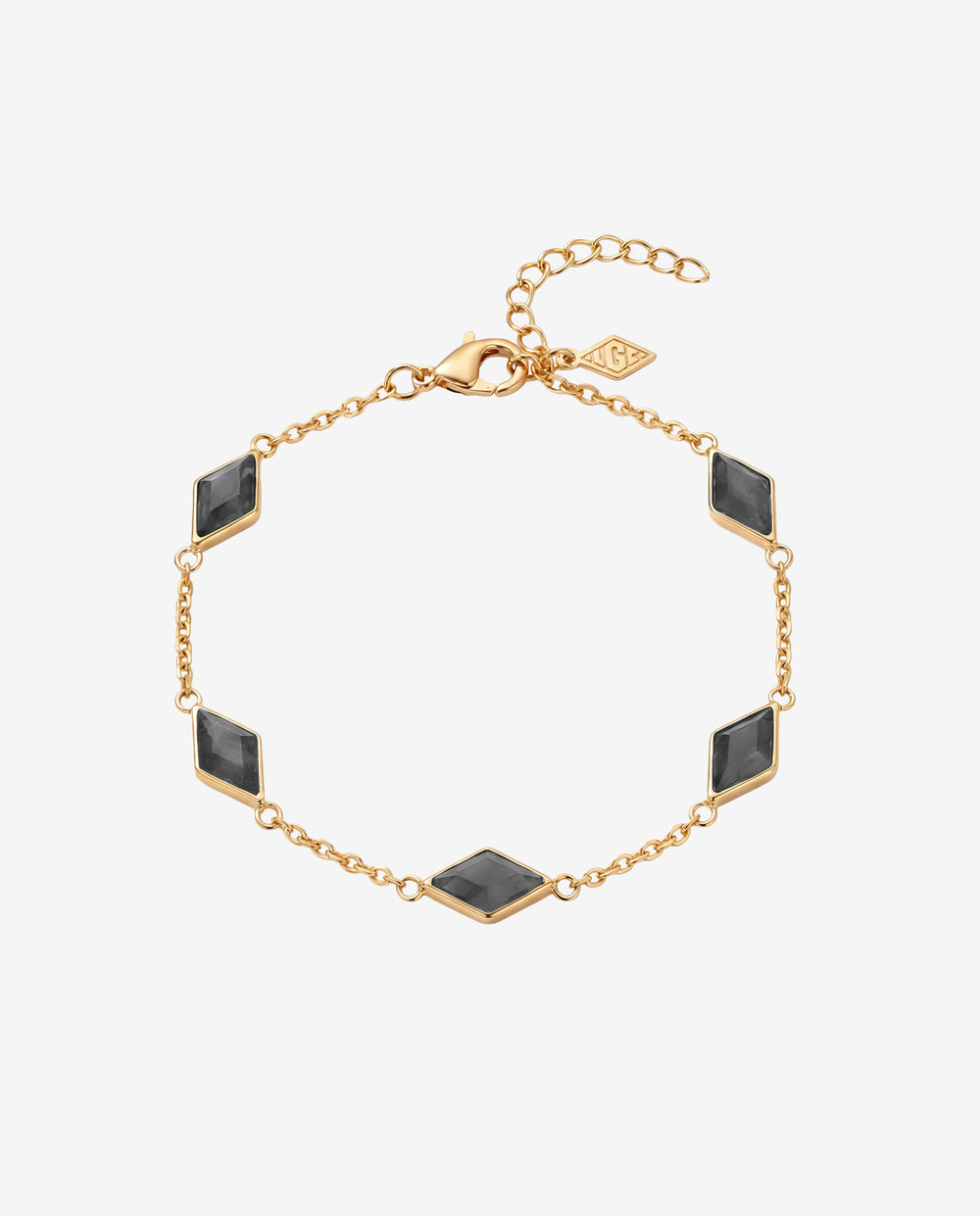 Amberes gold bracelet with black rectangular stones set along a delicate chain.