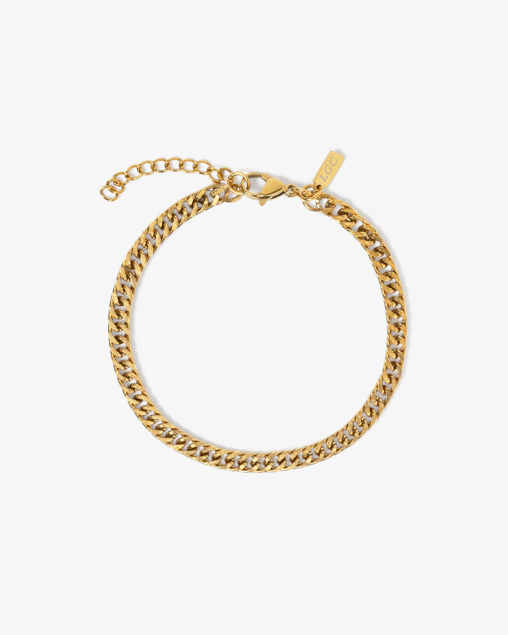 Gold coral chain bracelet with adjustable extension worn on the wrist