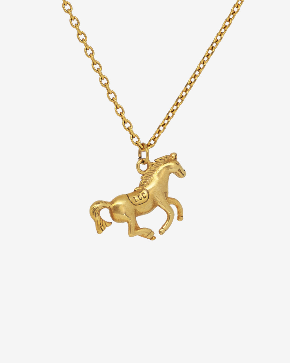Monaco Gold Necklace featuring a detailed horse pendant and an adjustable chain