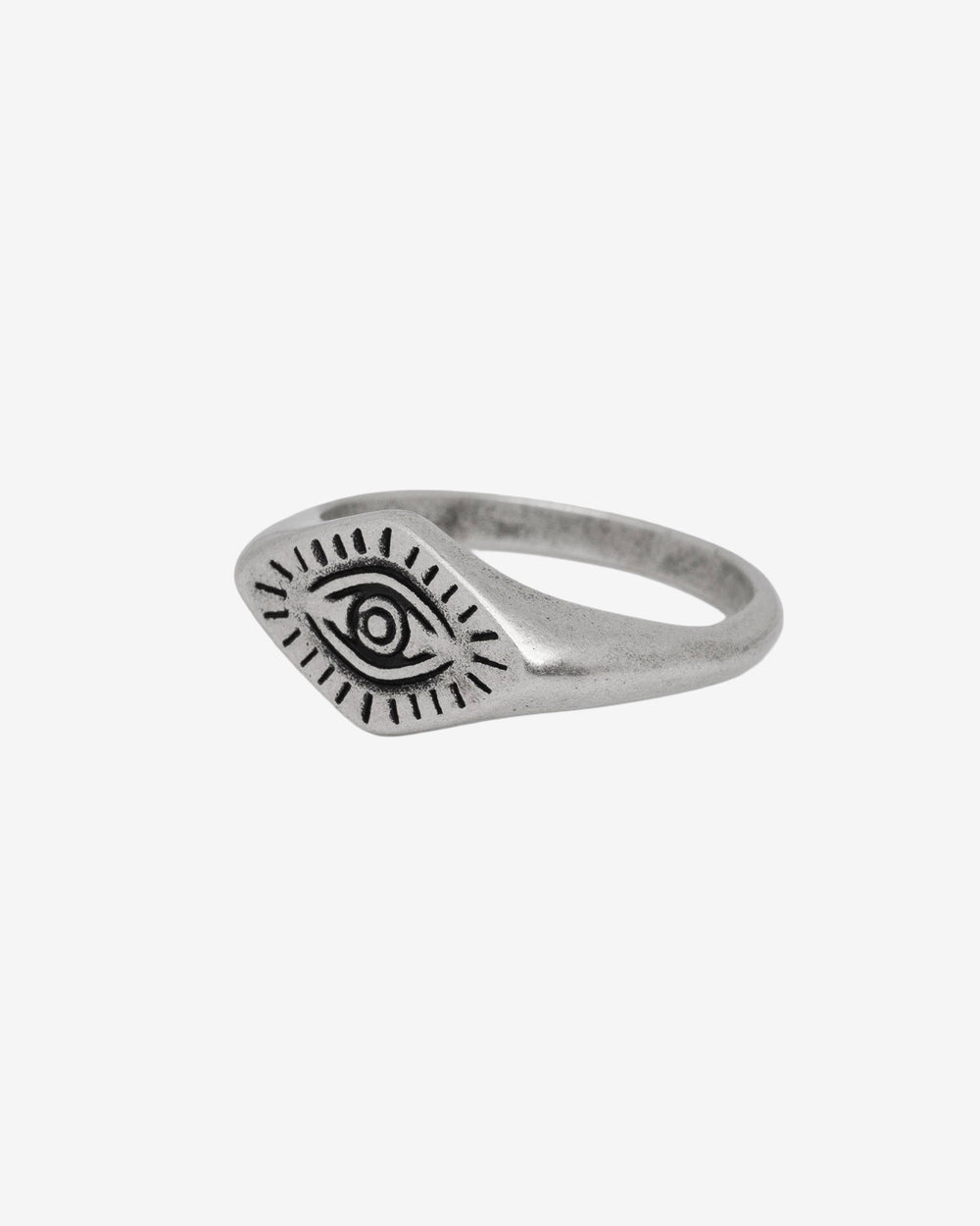 Close-up of ORUS silver ring featuring an ancient eye symbol on a rounded band.