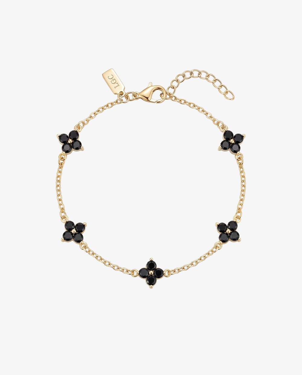 Goldenes Clover Armband mit Blütenanhängern aus schwarzen Schmucksteinen entlang einer feinen Kette