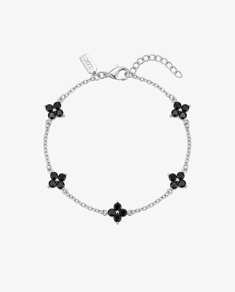Silver Clover bracelet with black gemstone flower charms along a delicate chain