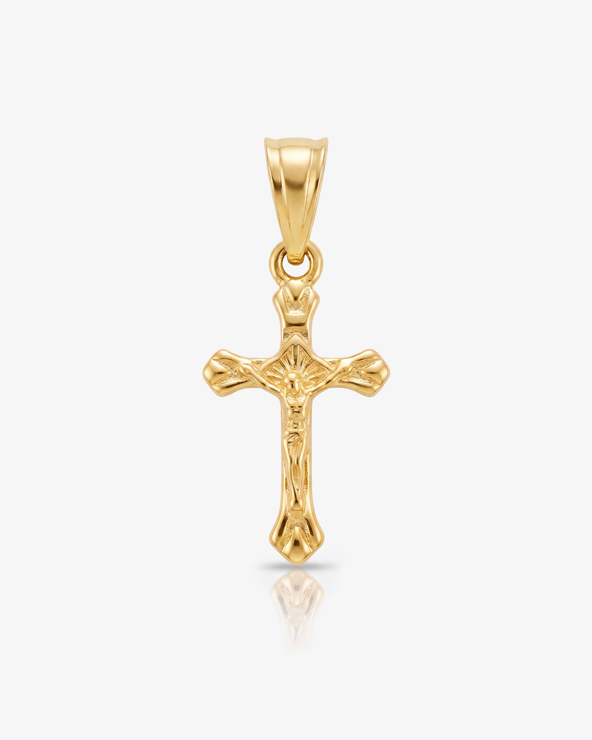 Charm MINI CROSS de oro con anilla decorativa en la parte superior.