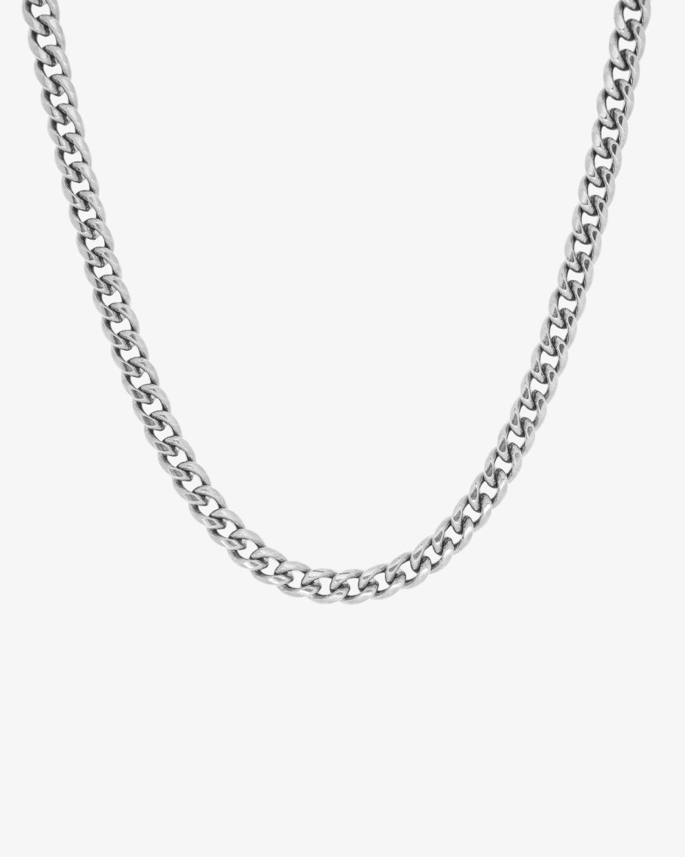 Close-up of a 5mm silver Cuban link chain necklace against a white background.