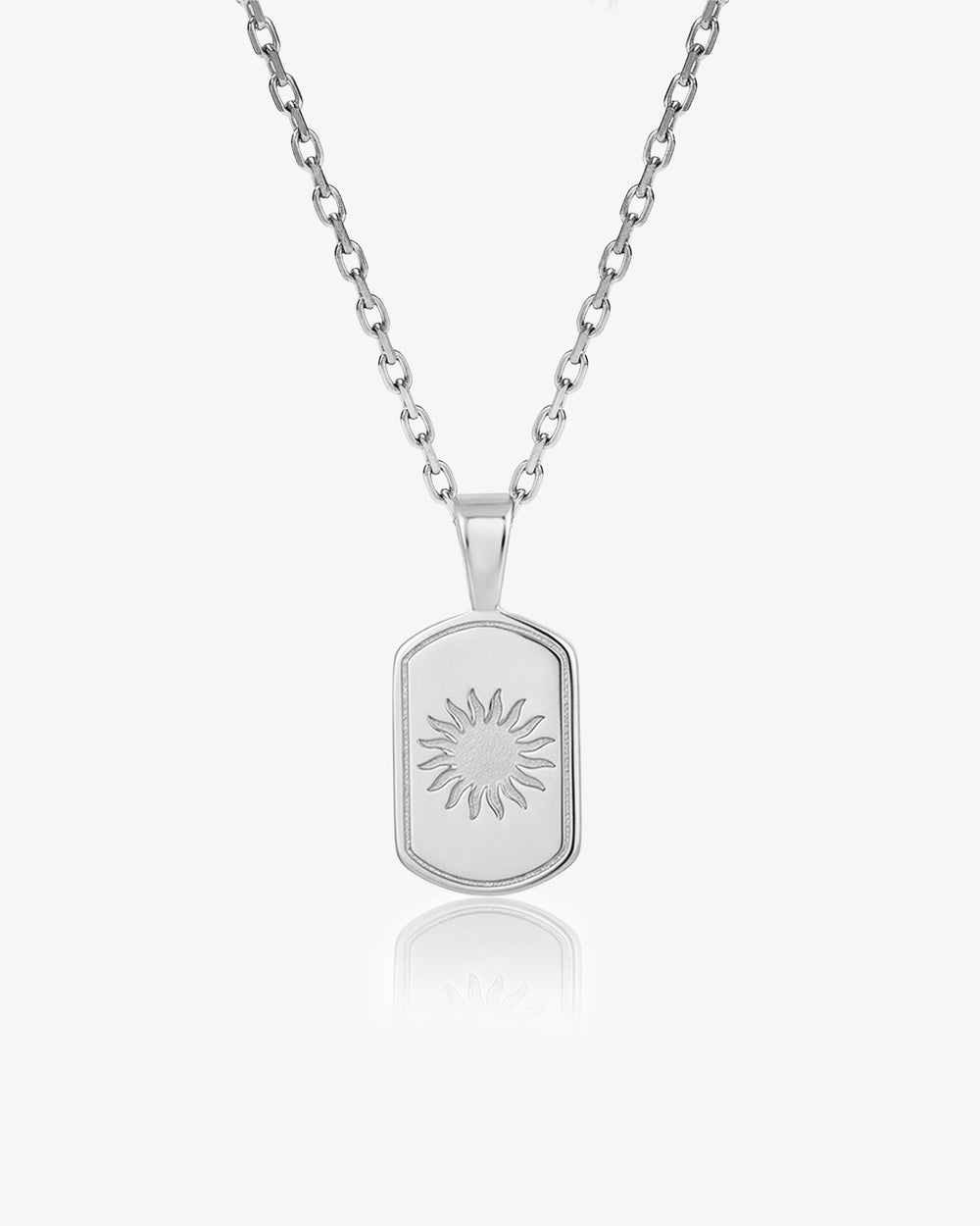 DAYSTAR silver necklace with a rectangular sunburst pendant on a white backdrop