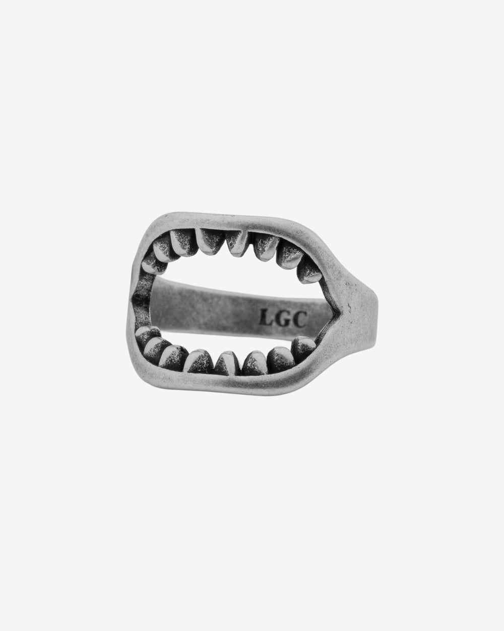 Shark jaw design ring in brushed silver on a finger