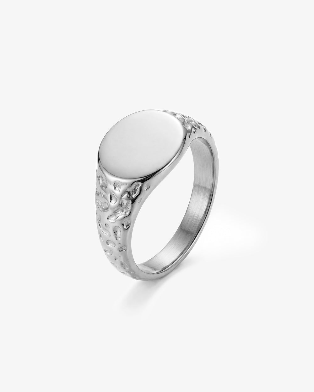 Eden silver ring with a large polished oval face and a textured patterned shoulder