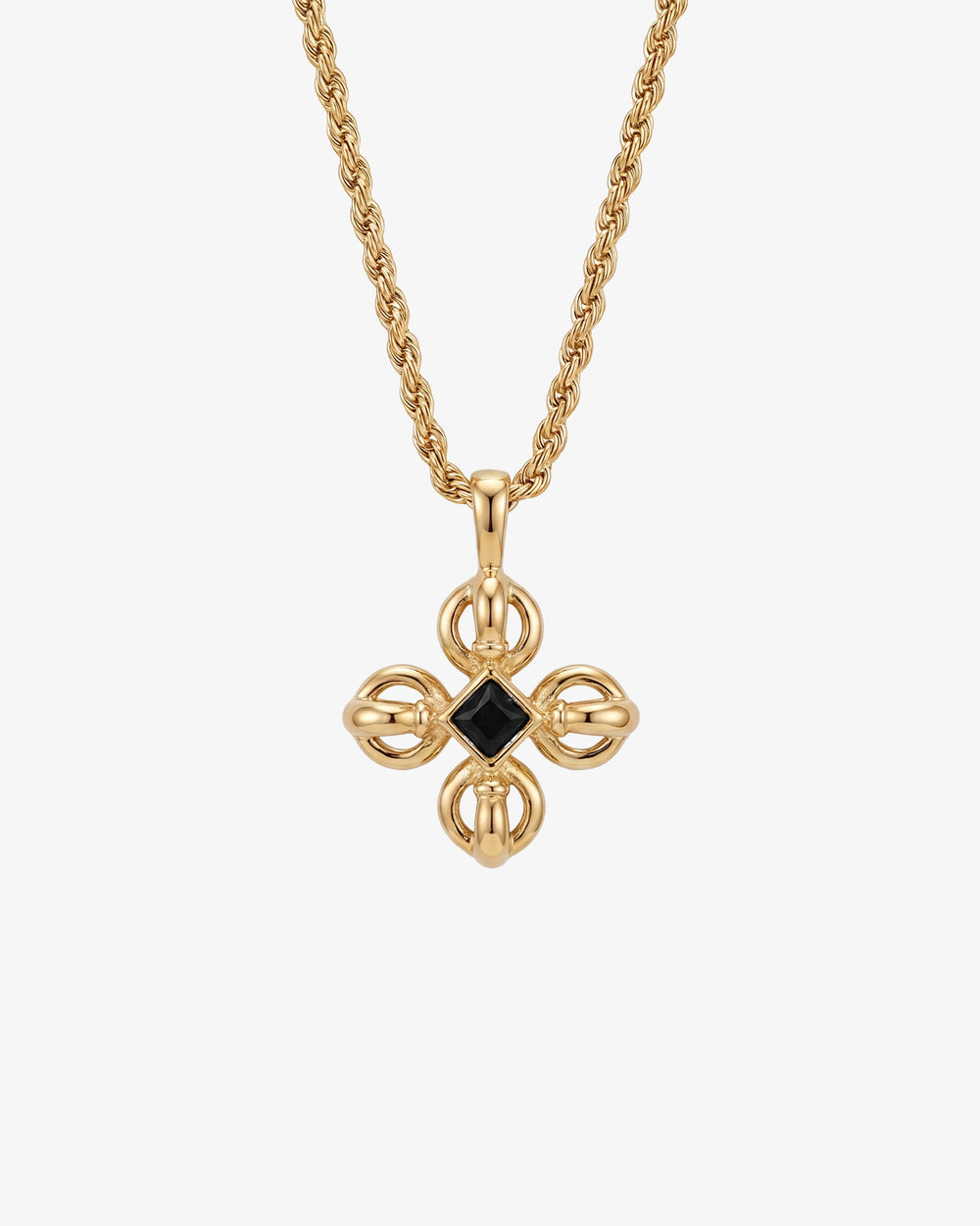 Gold flare necklace featuring a sunburst framed pendant with a black oval gemstone
