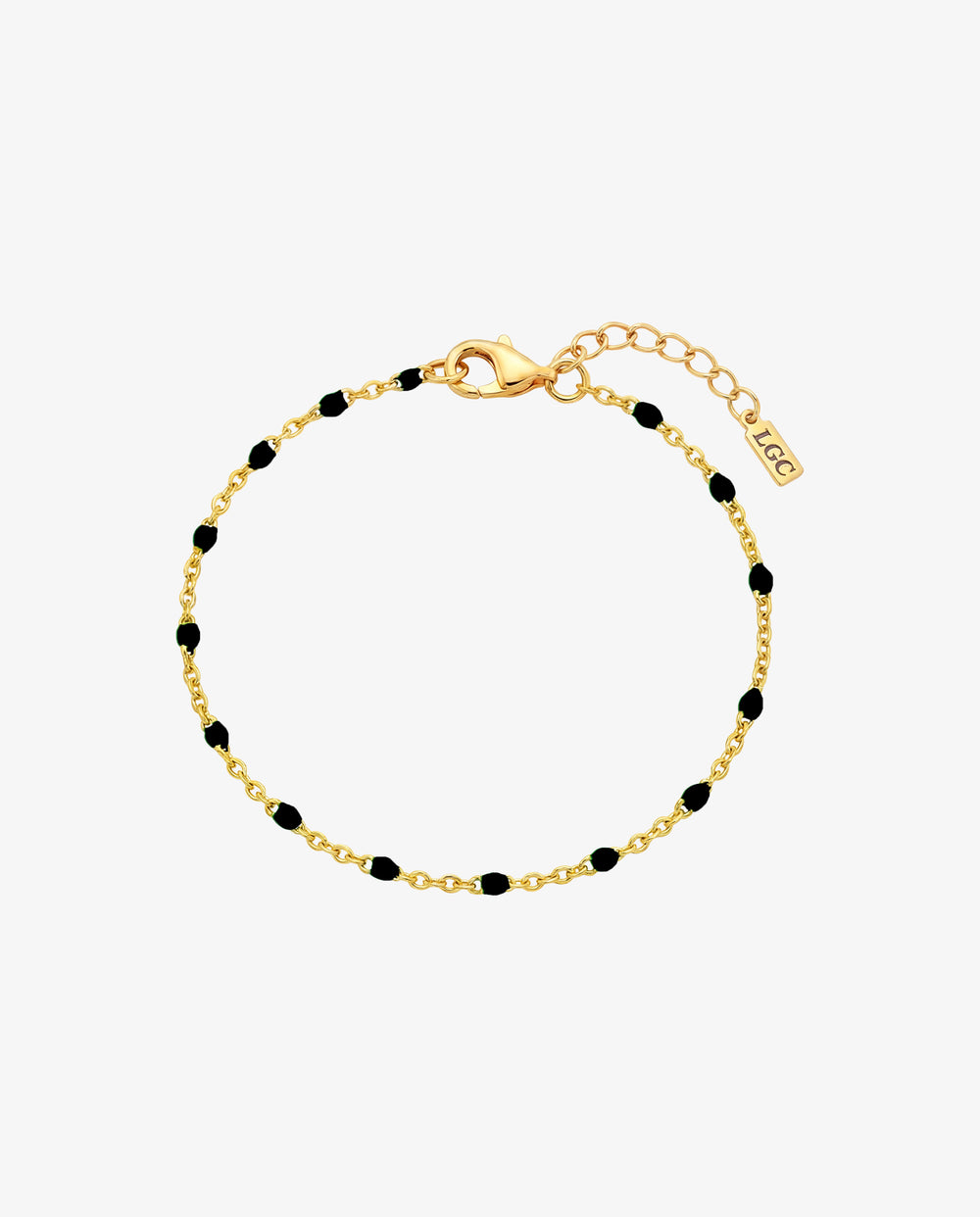 GEM gold bracelet with black beads along a gold chain and lobster clasp