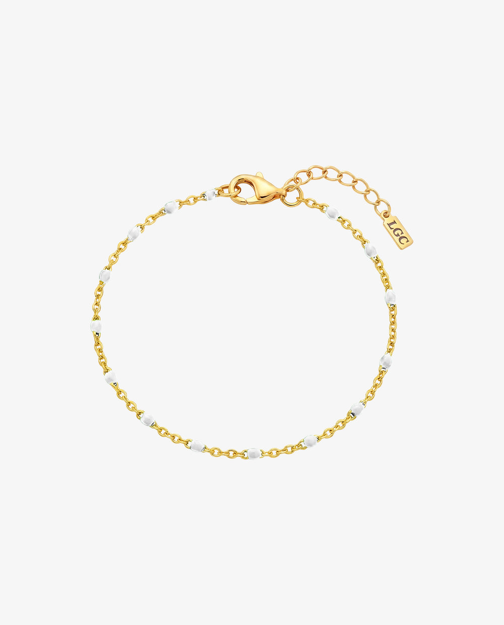 GEM GOLD BRACELET with white beads along a slim gold chain and adjustable length