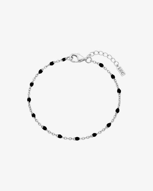 GEM silver bracelet with black beads along a silver chain and lobster clasp