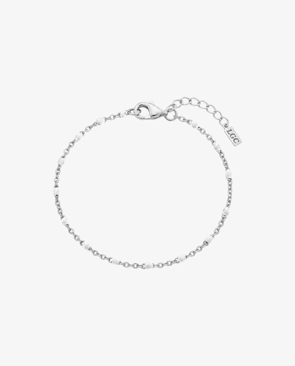 Silver bracelet with small round beads along a delicate chain and a lobster clasp
