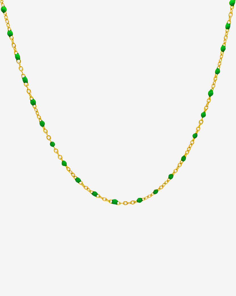 50 cm gold chain necklace with evenly spaced green beads on a white background.