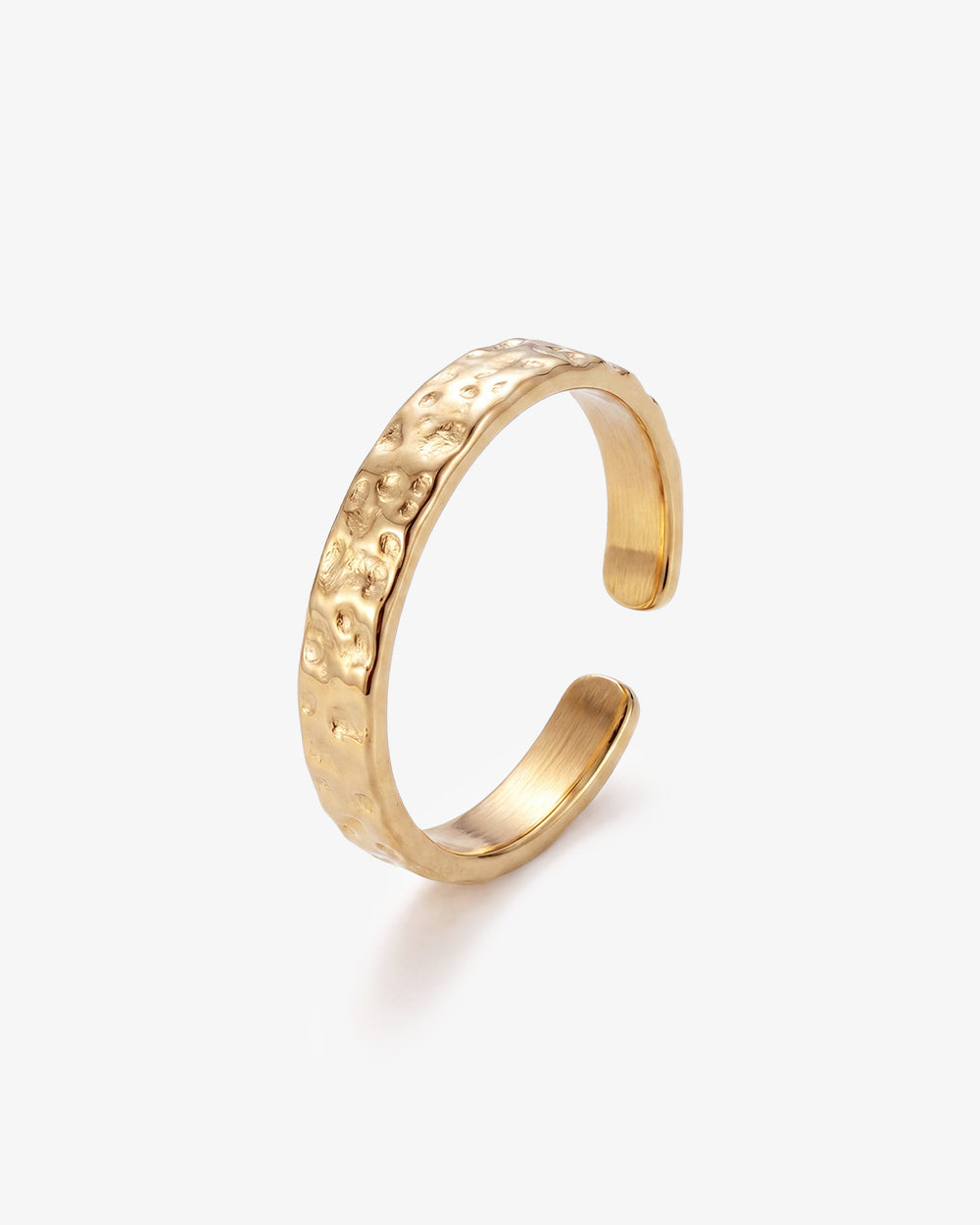 Hammered gold open cuff ring with a textured surface