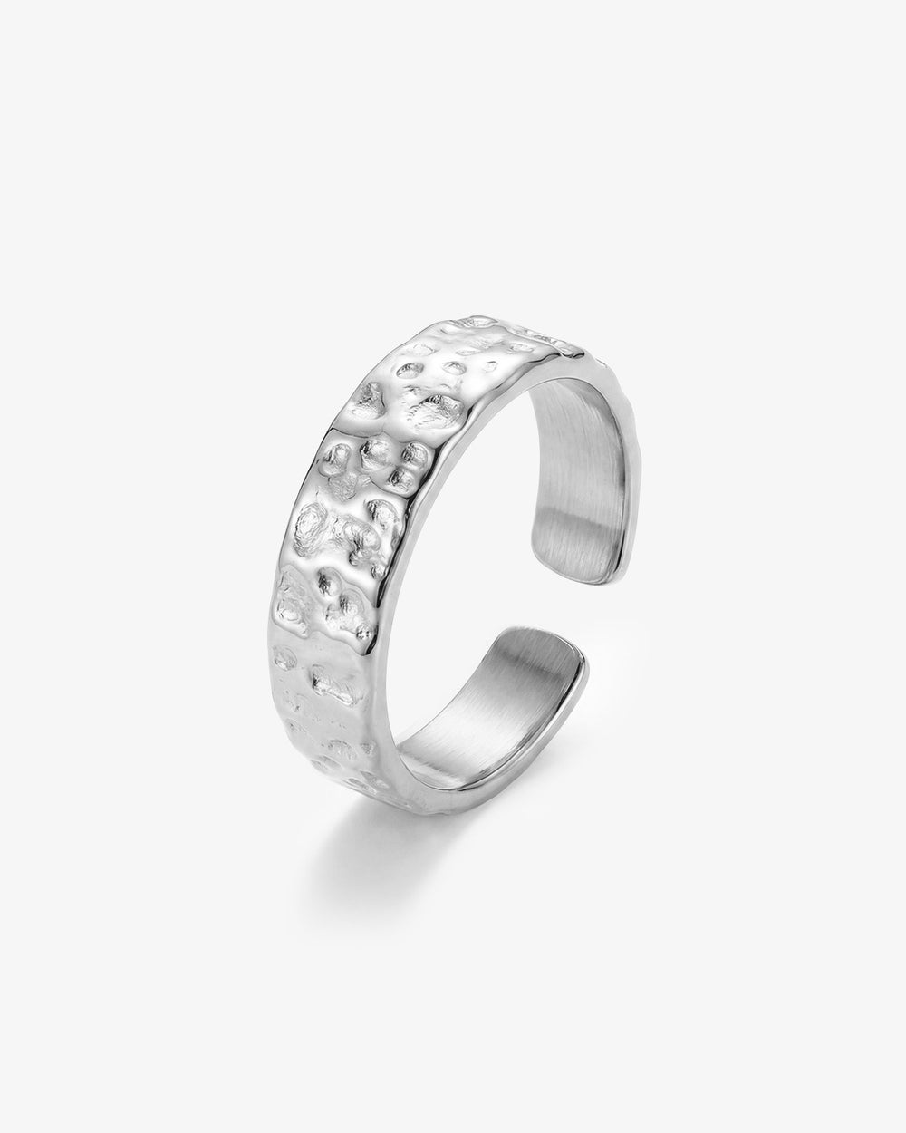 Hammered silver ring 6mm wide with a textured irregular surface