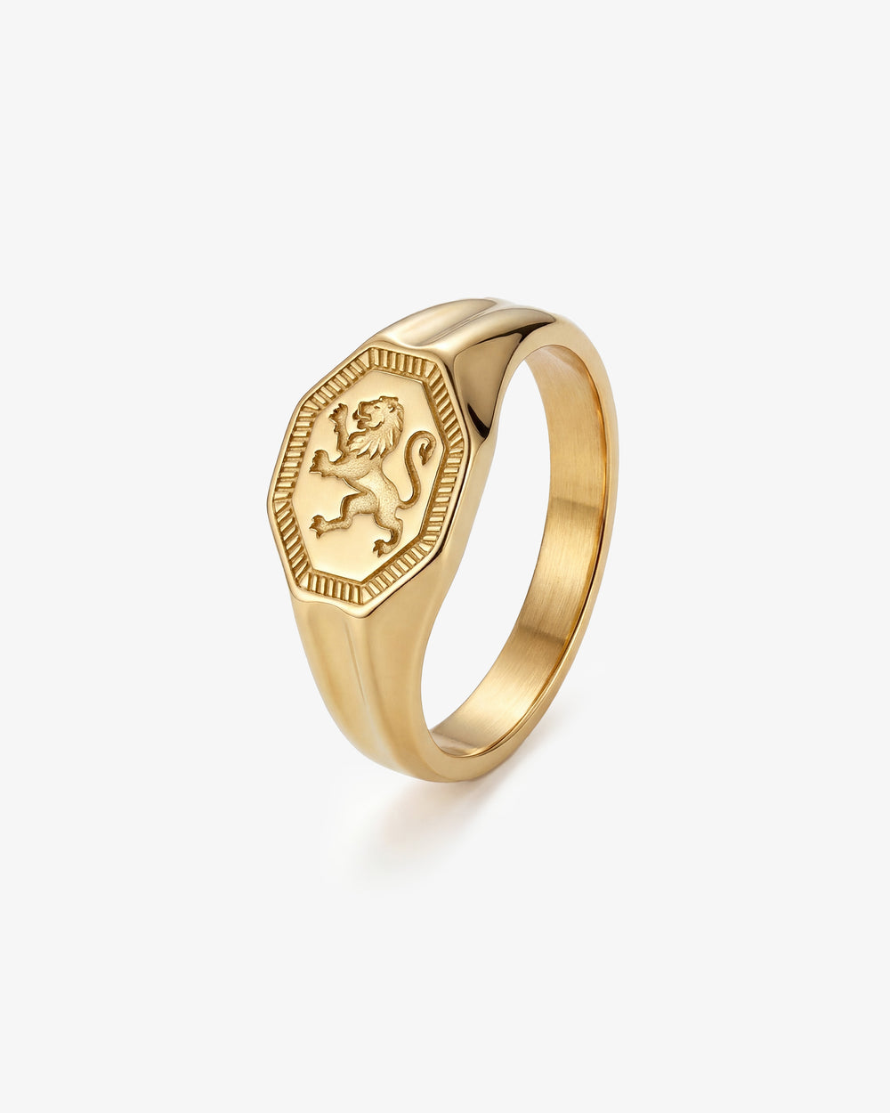 Legacy gold ring with a lion crest on a shield shaped face
