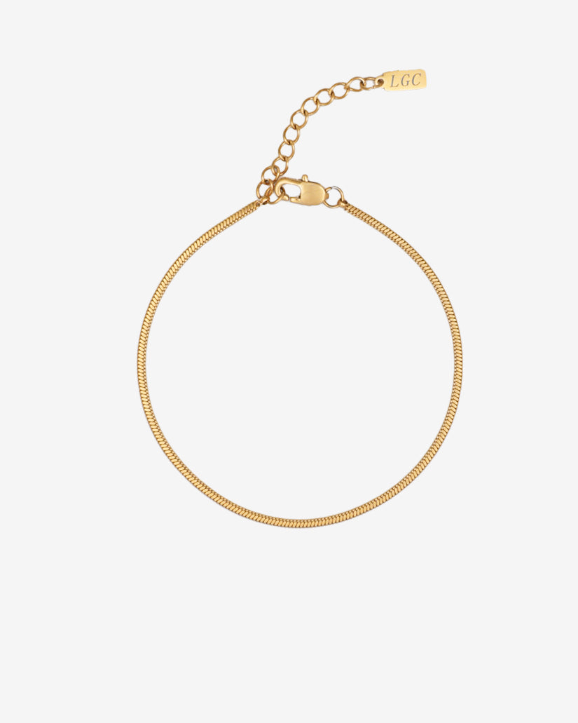 Lima Gold Bracelet delicate gold chain laid flat with an adjustable extender