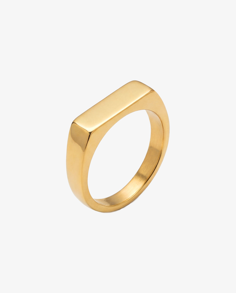 Gold chain bracelet on the wrist with a matching gold ring on the finger.