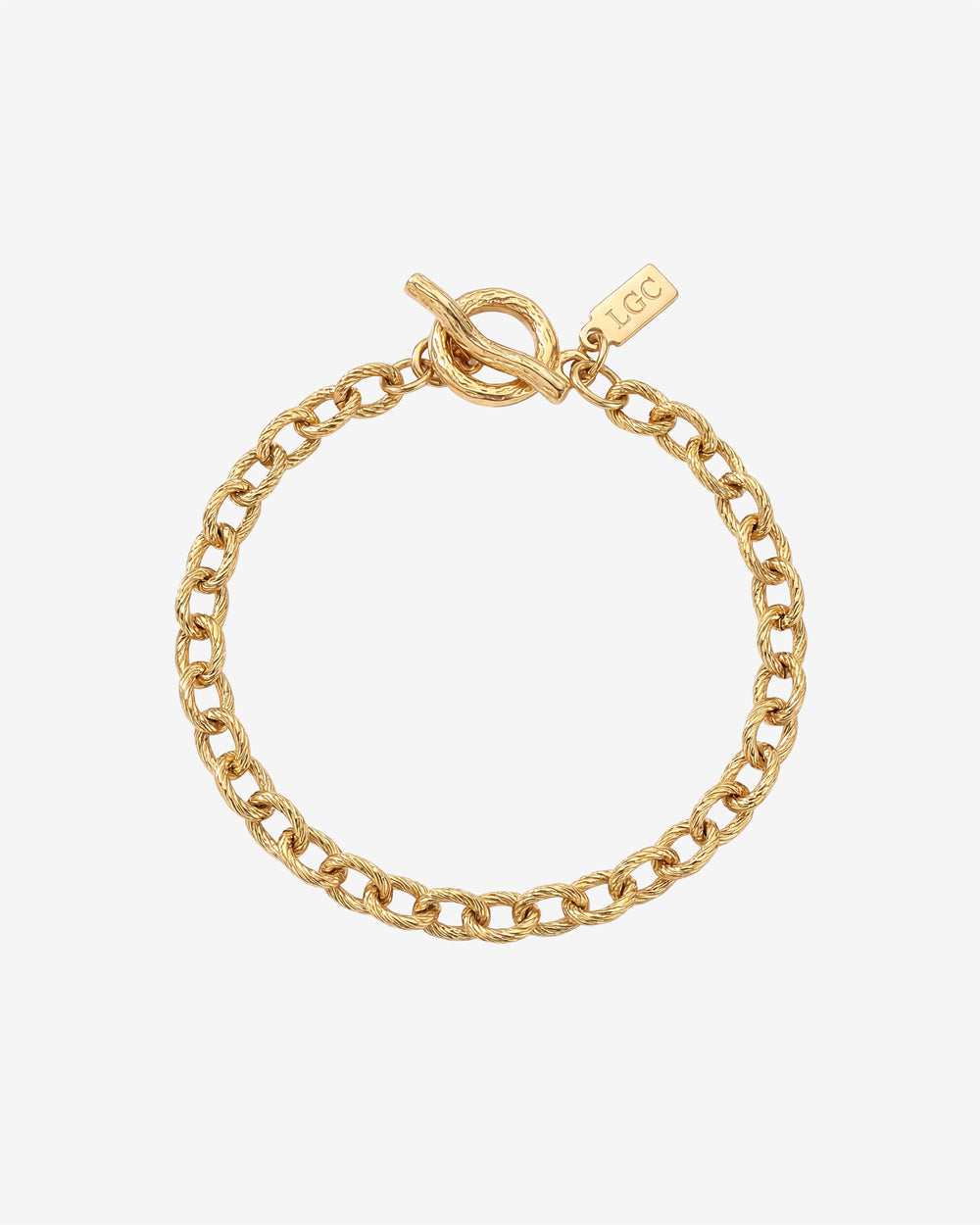 Gold Saona bracelet with textured links and circular toggle clasp