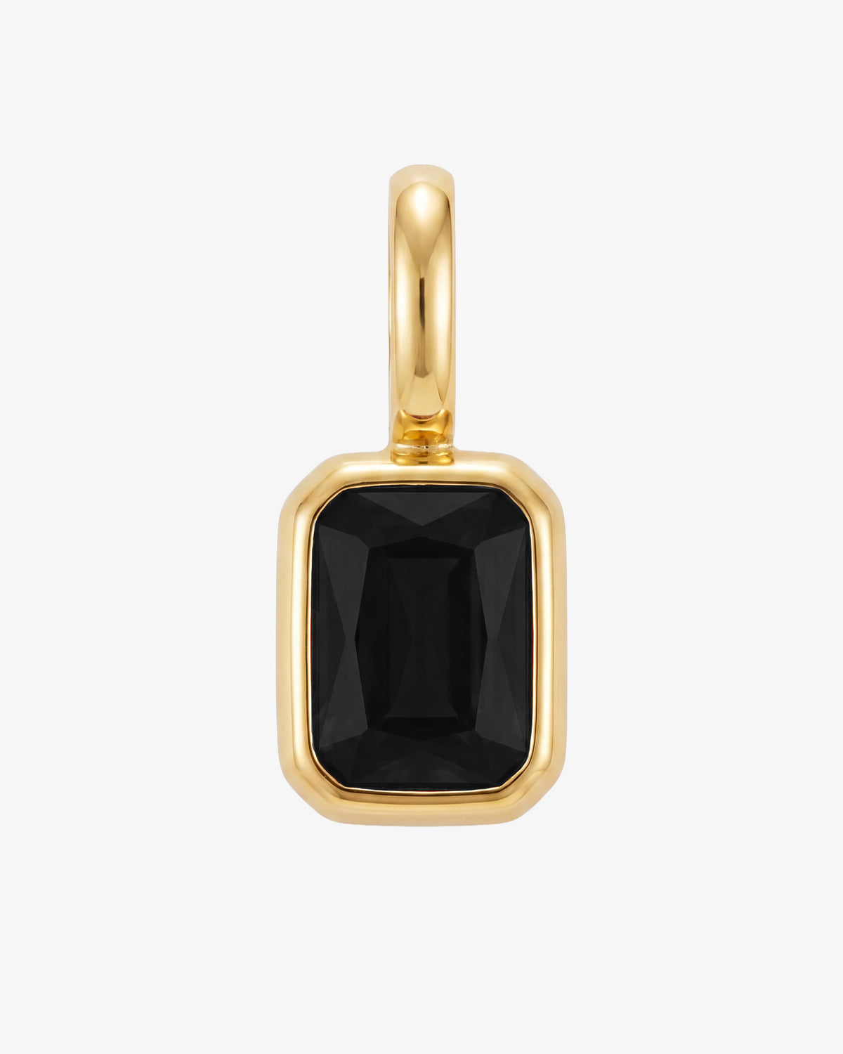 Mini Solstice Charm pendant with a large black gemstone in a gold bezel setting