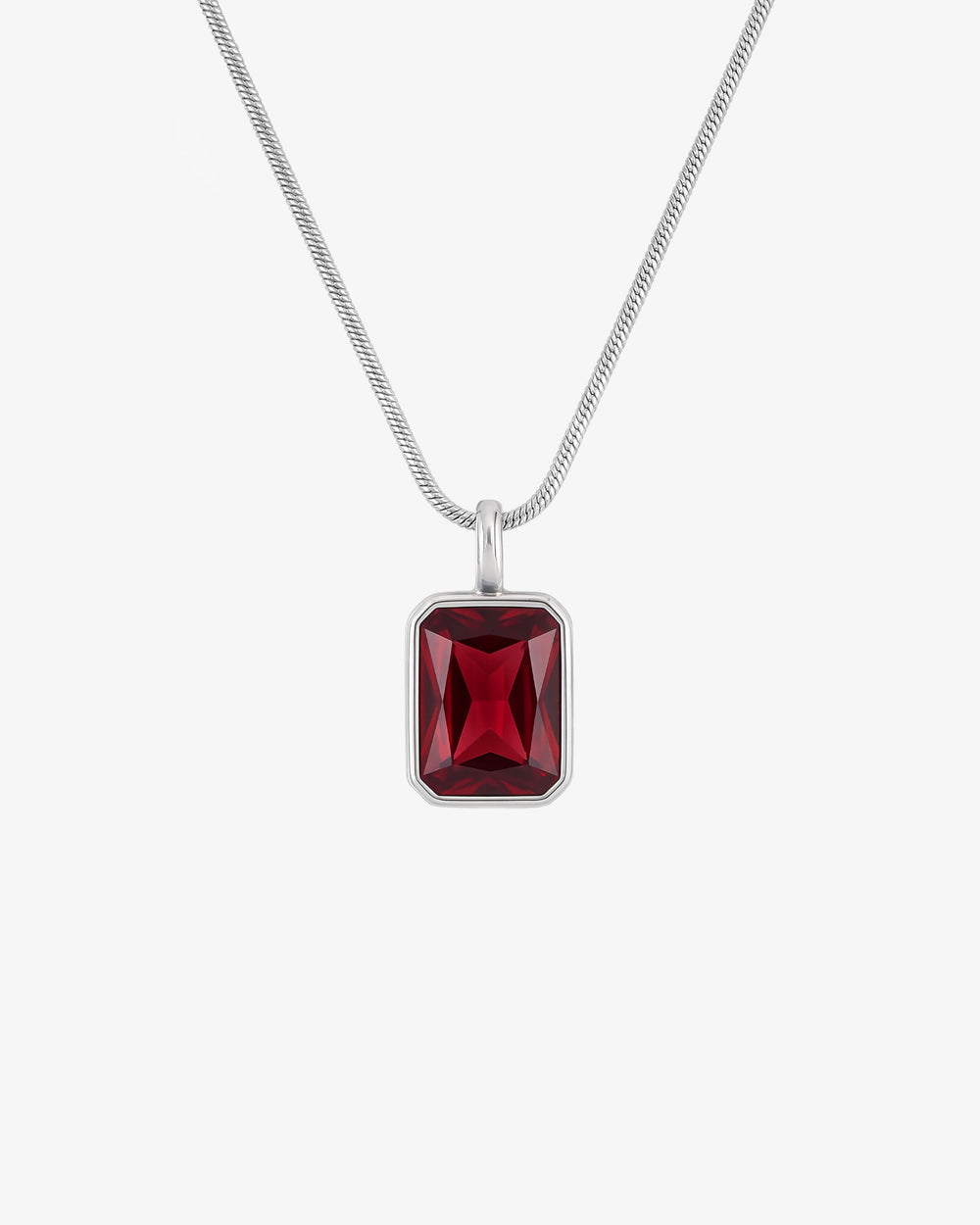 Solstice Silver Necklace with a rectangular red gemstone pendant on a silver chain against a white background