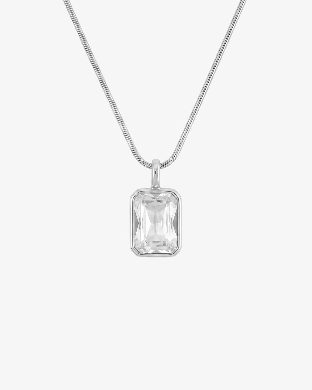 Solstice silver necklace featuring a large rectangular clear gemstone pendant
