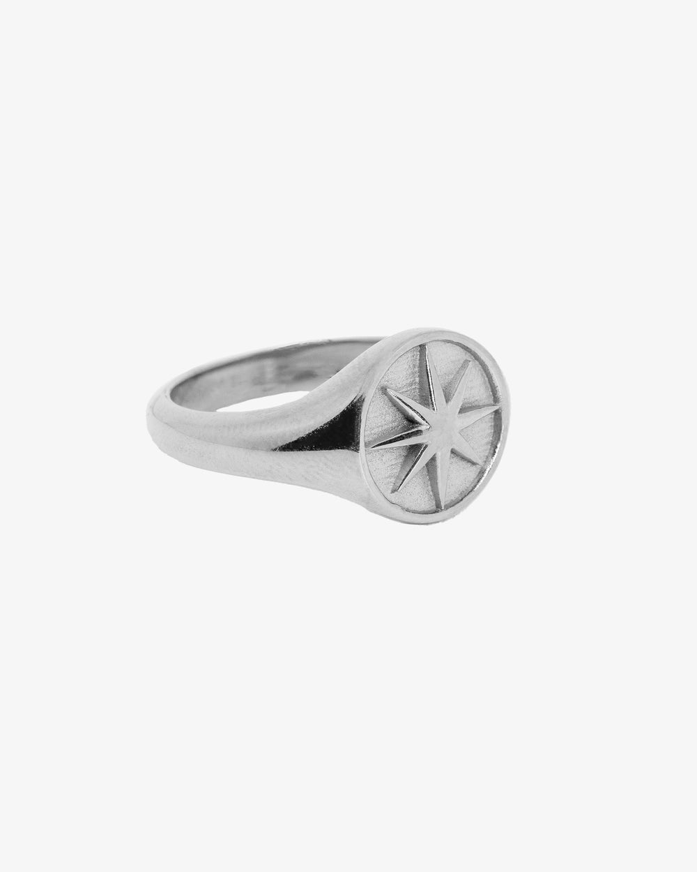 Star Silver Ring with a minimal star motif on top worn on the finger